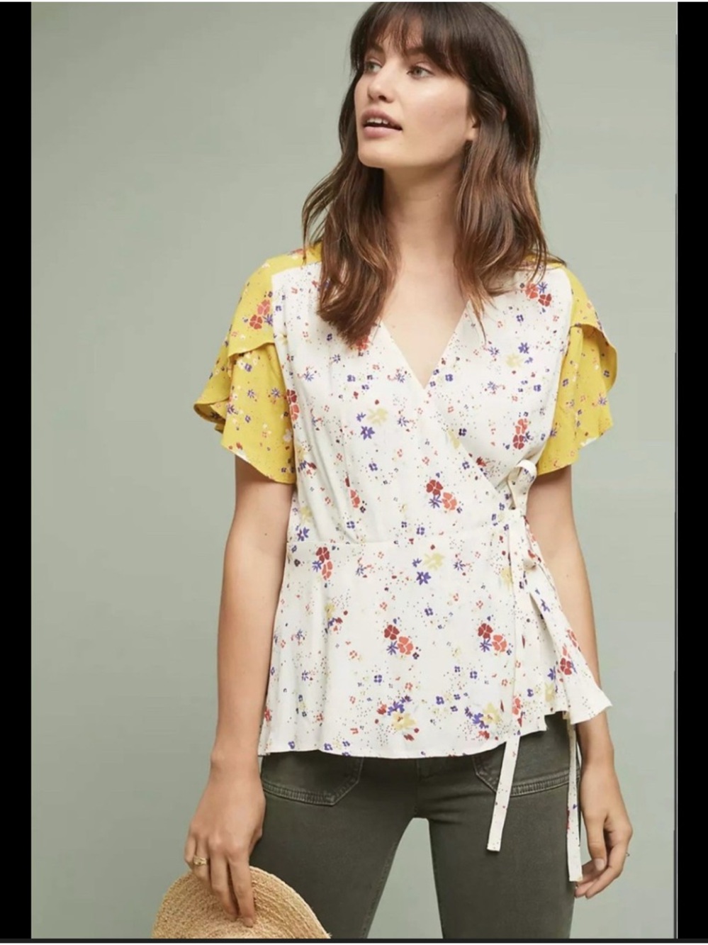 Anthropologie Cream Floral Wrap Top with Yellow Flutter Sleeves